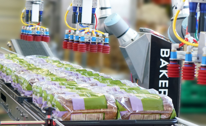 Baker-Bot moving finished products into a box